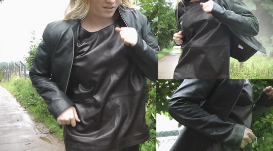 Emily-in-leather-gloves-and-leather-shirt-running-in-rain