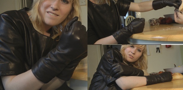 girl-in-long-leather-gloves-and-leather-shirt-punching-fist
