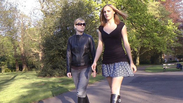 girls-in-leather-boots and-gloves-walking
