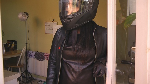 biker-girl-leather-shirt-and-leather-gloves