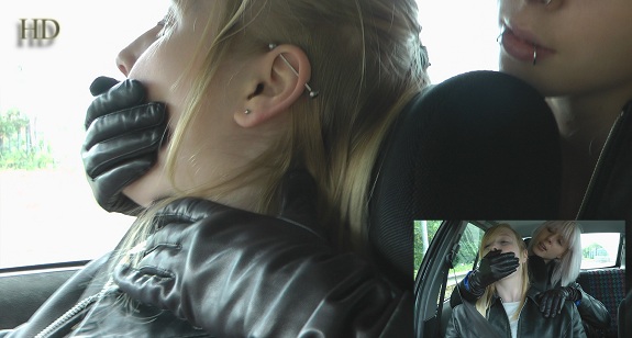 girl-hand-mouth-leather-gloves-in-car