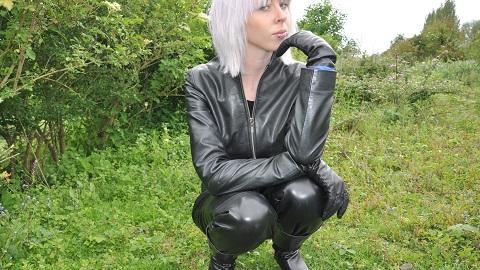 girls-in-leather-pants-leather-jacket-with-leather-boots-and-leather-gloves-railway